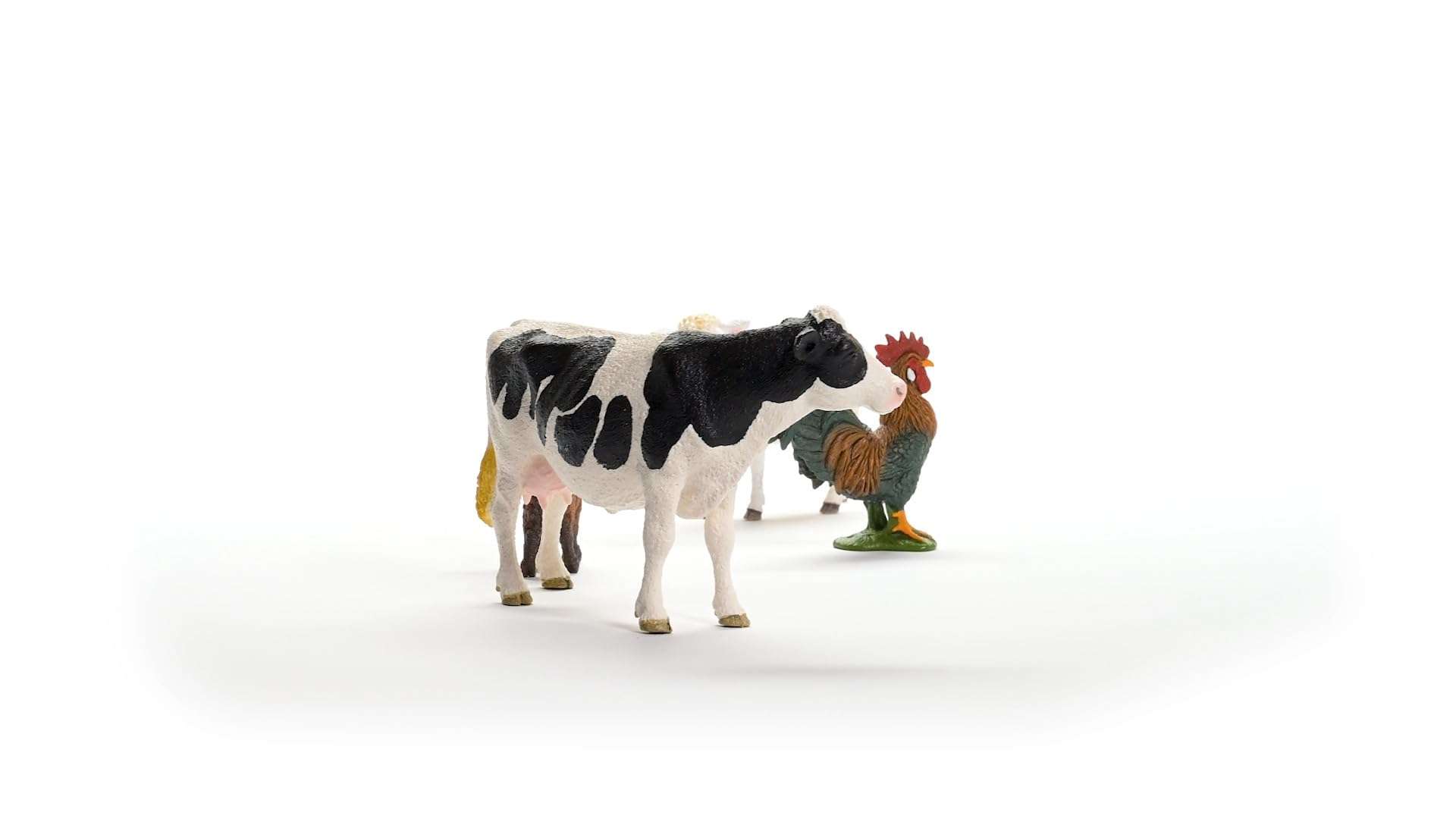 Schleich Farm World - Starter Set, Includes 4 x Collectible Toy Farm Animals, Cow, Sheep, Donkey Foal and Rooster Farm Animal Toys for Kids Ages 3+ 5