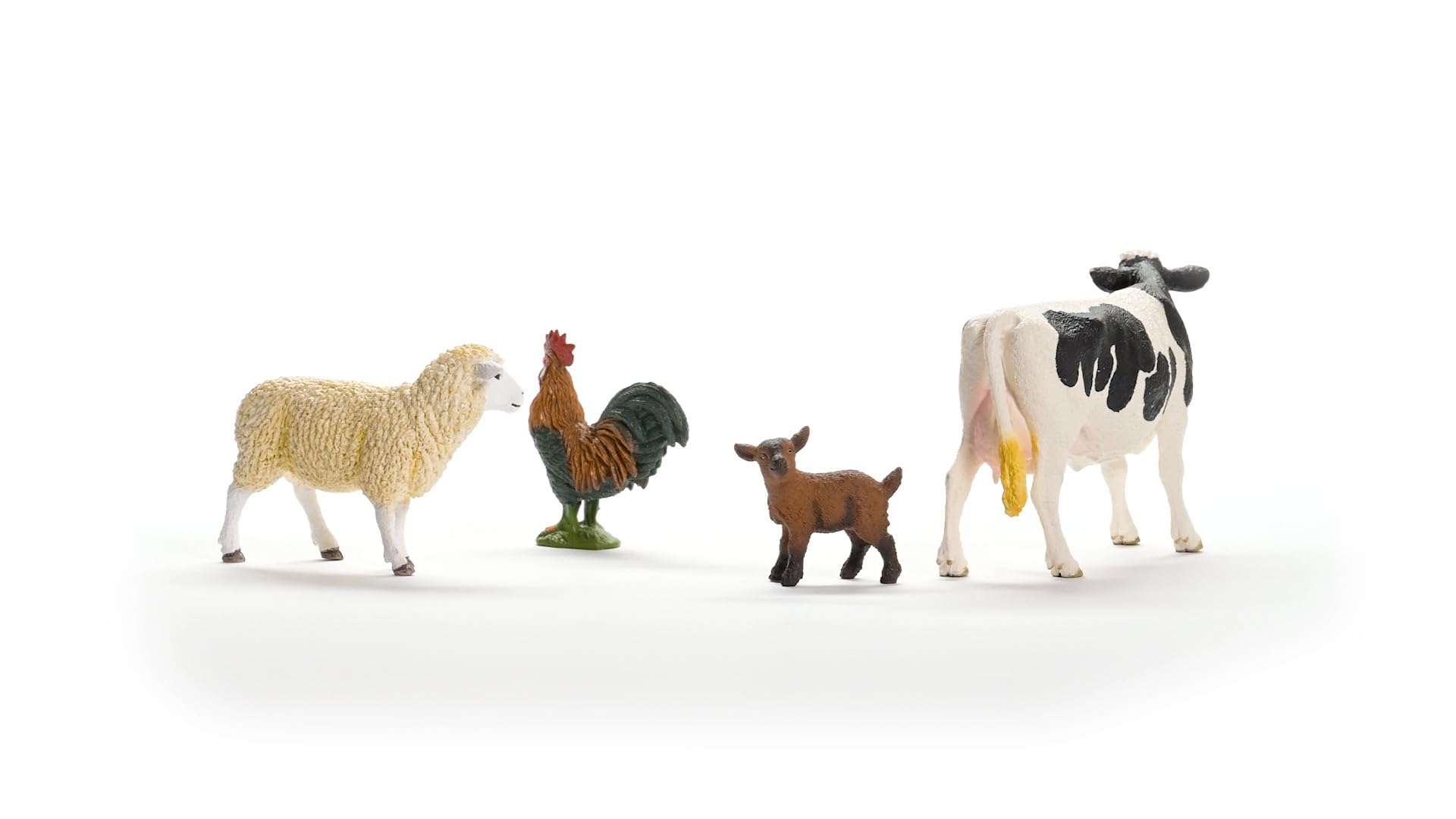 Schleich Farm World - Starter Set, Includes 4 x Collectible Toy Farm Animals, Cow, Sheep, Donkey Foal and Rooster Farm Animal Toys for Kids Ages 3+ 4