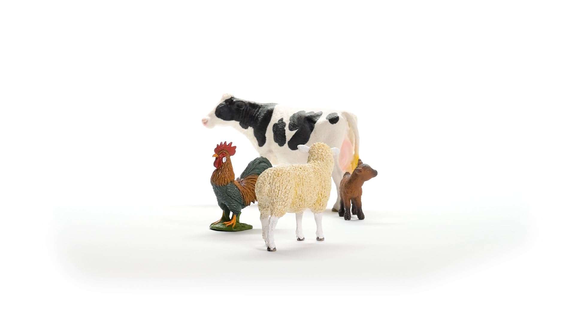 Schleich Farm World - Starter Set, Includes 4 x Collectible Toy Farm Animals, Cow, Sheep, Donkey Foal and Rooster Farm Animal Toys for Kids Ages 3+ 6