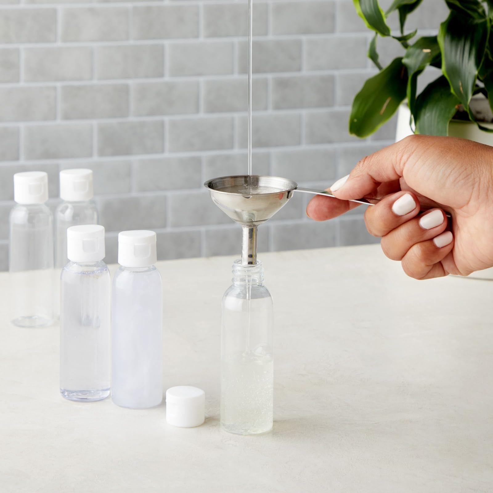 HMIASFMK 24 Pack Plastic Empty 2oz Travel Bottles with Flip Cap, Refillable Containers for Toiletries, Lotion, Liquid 4