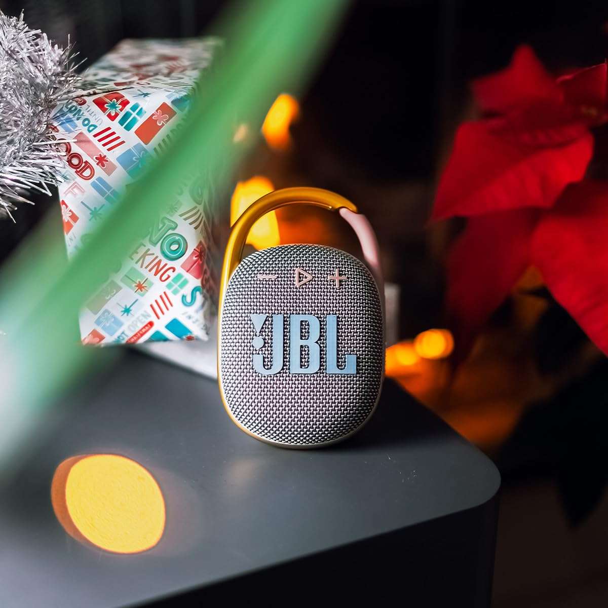 JBL Clip 4 - Portable Mini Bluetooth Speaker, big audio and punchy bass, integrated carabiner, IP67 waterproof and dustproof, 10 hours of playtime, speaker for home, outdoor and travel (Grey) 4