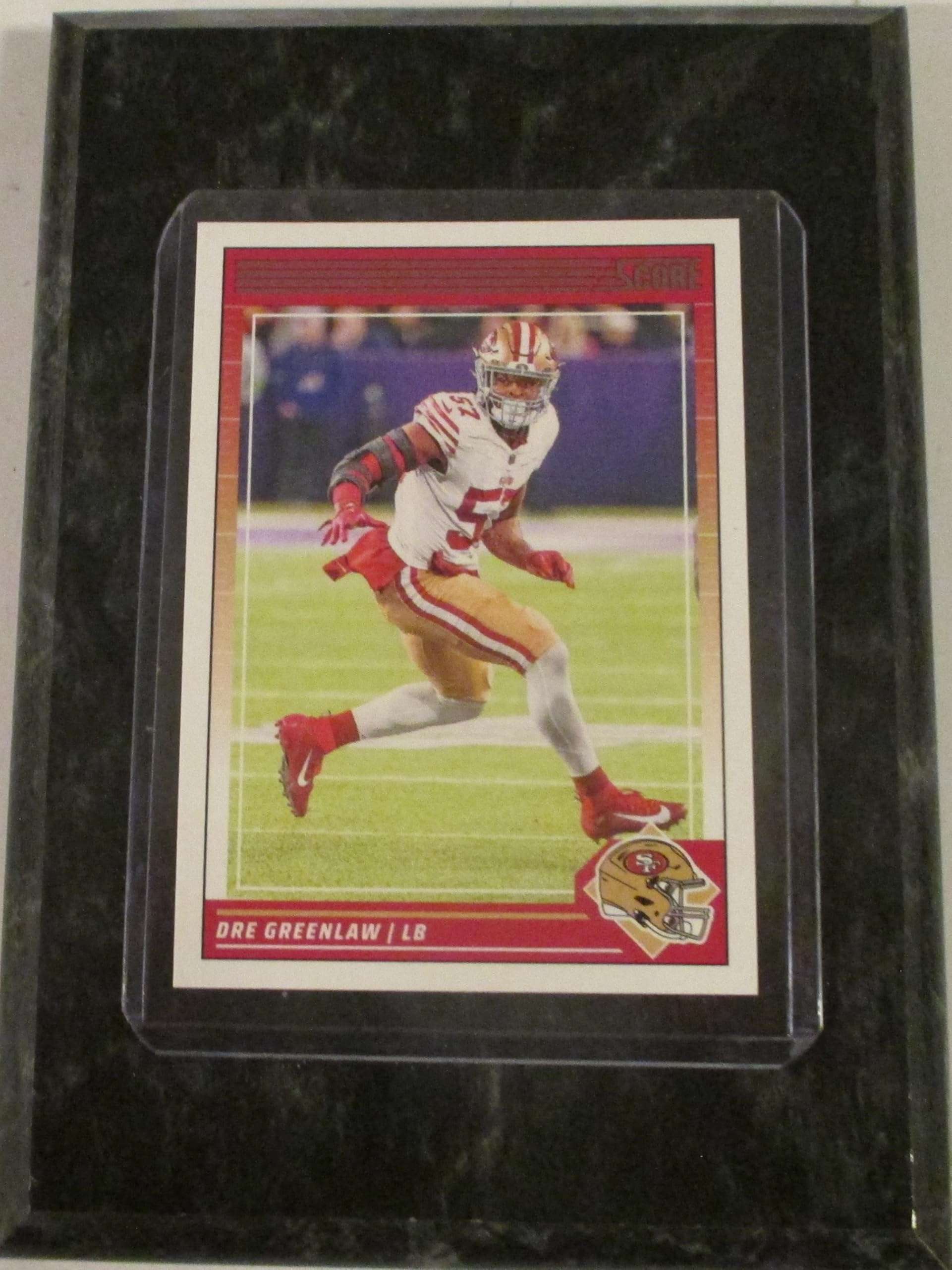 DRE GREENLAW SAN FRANCISCO 2024 SCORE FOOTBALL COLLECTIBLE FOOTBALL CARD MOUNTED ON A "4 X "6 BLACK MARBLE PLAQUE 1
