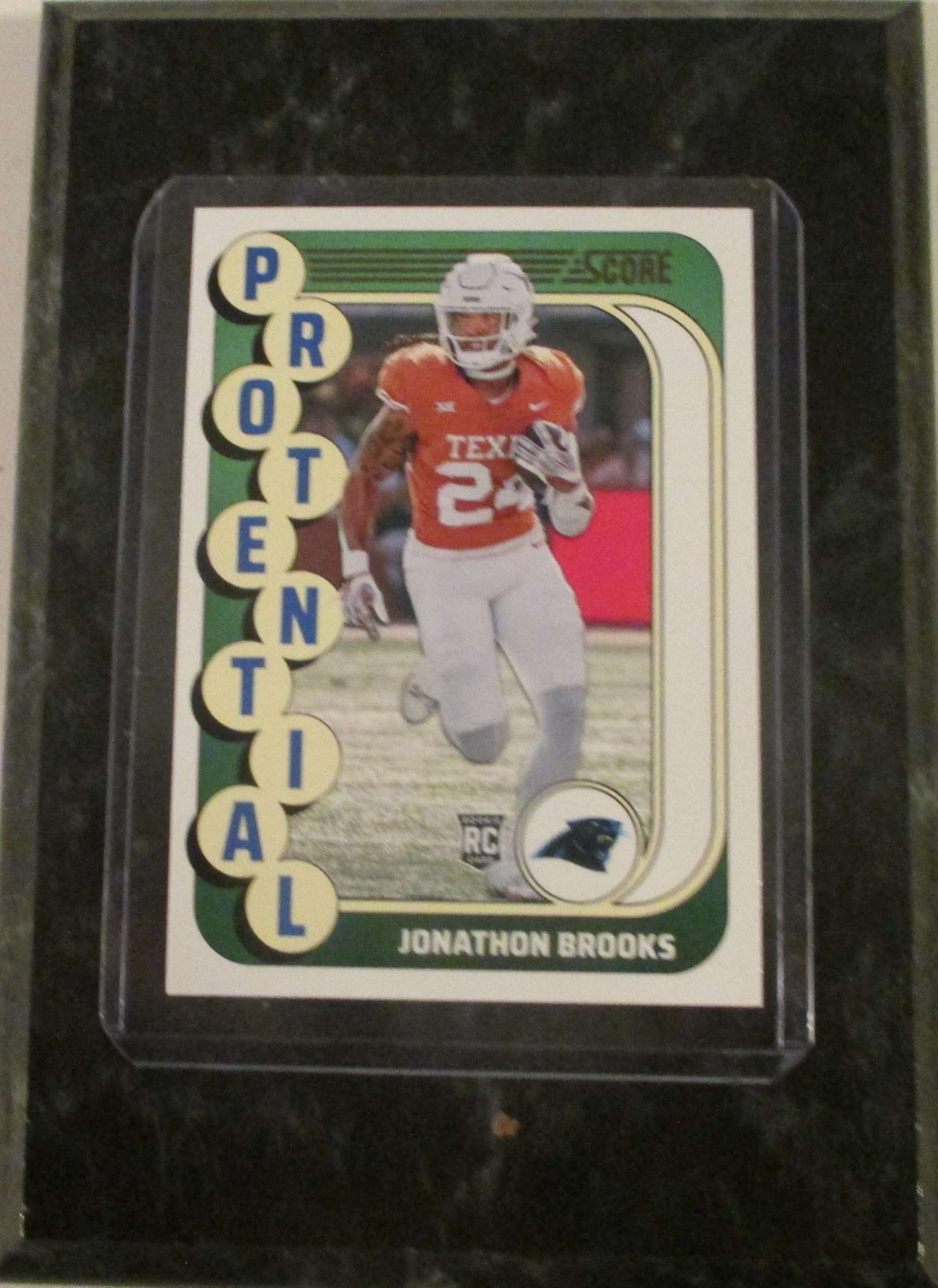 JONATHON BROOKS CAROLINA PROTENTIAL ROOKIE 2024 SCORE FOOTBALL COLLECTIBLE PLAYER CARD MOUNTED ON A 4" X 6" BLACK MARBLE PLAQUE 1