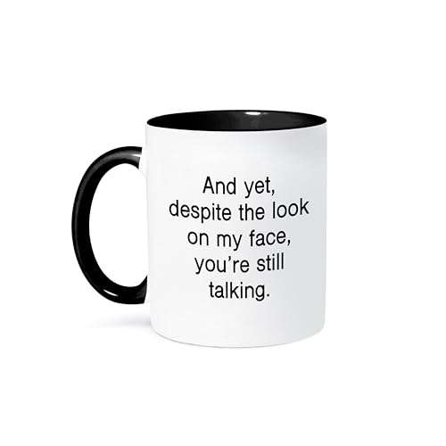 3dRose AND YET, DESPITE THE LOOK ON MY FACE, YOURE STILL TALKING. 11oz Two-Tone Black Mug 1