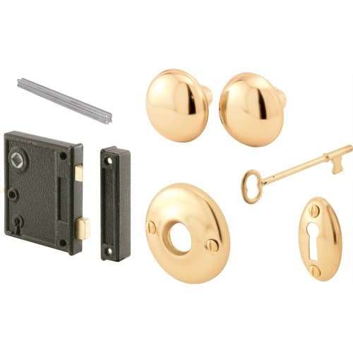 Prime-Line E 2437 Vertical Trim Vintage Lock Set – Cast Steel, Brass Plated Knobs, Antique Skeleton Key Lock System – 2-1/2” Backset, Surface Mounted, Right-Hand Swing-In Interior Doors (Single Pack) 1