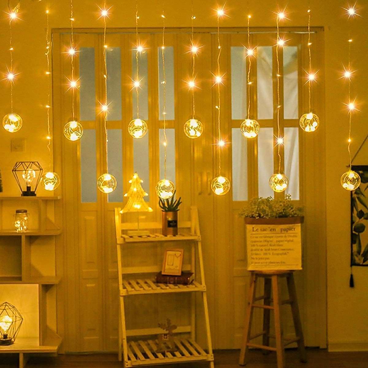 One94Store 12 Wish Ball Curtain LED String Lights – Pack of 1, 3 Meter Warm White Curtain Light with 108 LEDs & 8 Flash Modes for Window, Room, Diwali & Festival Decoration 1