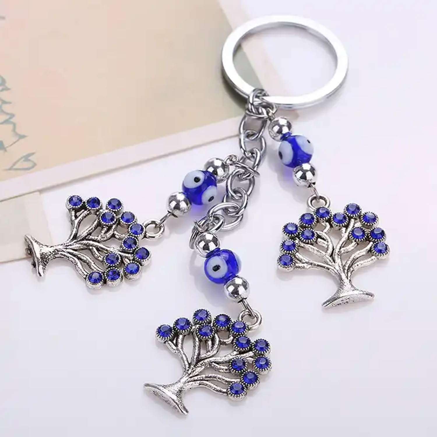 AUGEN Premium Blue Evil Eye Three Trees Design Keychain Metal Vastu Good Luck Charm Protection With Key Ring Anti-Rust (Pack Of 1) 3
