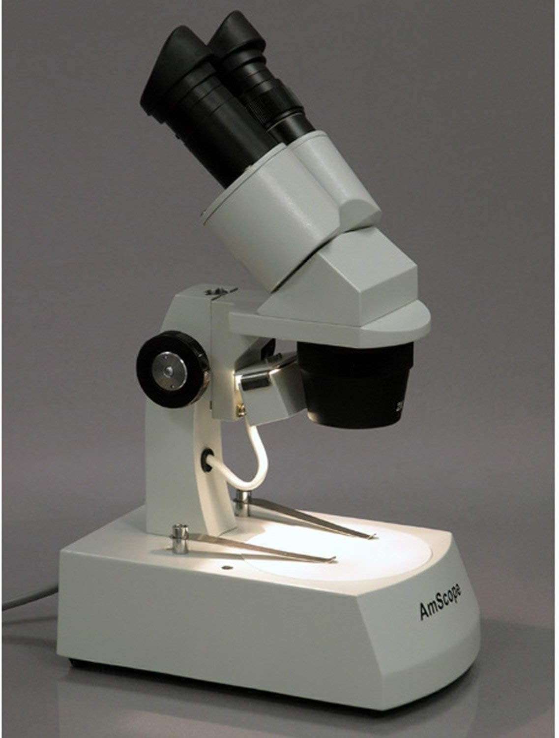 AmScope SE305-AZ-M Digital Binocular Stereo Microscope, WF10x and WF20x Eyepieces, 10X/20X/30X/60X Magnification, 1X and 3X Objectives, Upper and Lower Halogen Lighting, Reversible Black/White Stage Plate, Arm Stand, 120V, Includes 1.3MP Camera with Reduction Lens and Software 3