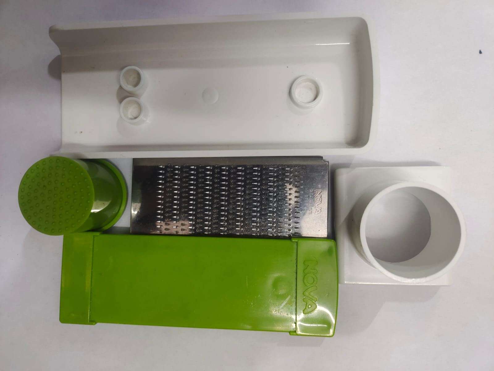 Nova Brand Kitchenware Plastic Micro Grater Used for Nut , Apple, Garlic , Ginger Root , Spices, Coconuts , Carrots ,Cheese Grater, Fruits & Vegetable Grating (Standard Size, Multicolour) 6