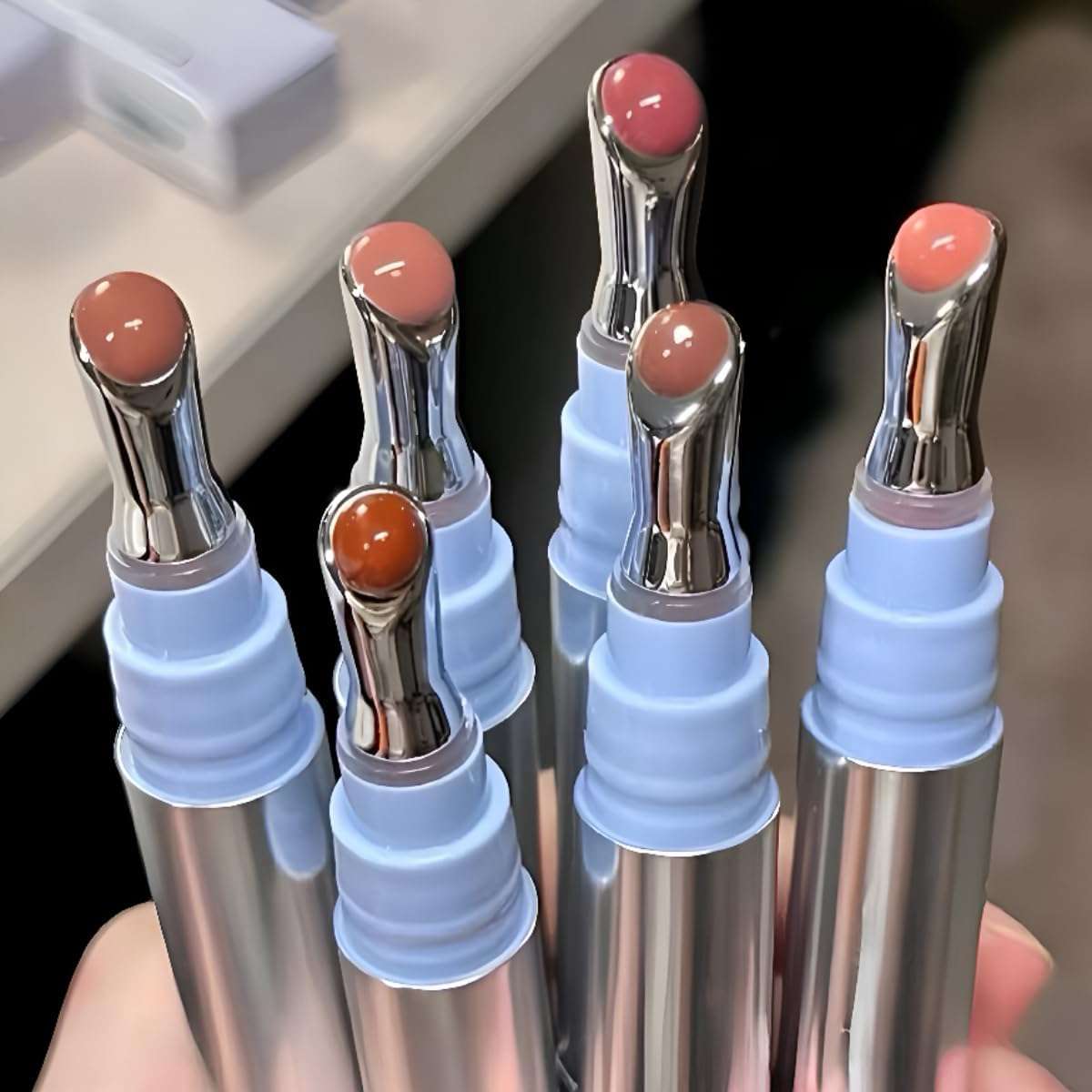 Cappuvini Mirror Water Shine Essence Lip Gloss | Moist and Submissive Light Texture | Moisturizing Lip Tint with Cooling Ice Roller Applicator | Lip Protection Formula | Long-Lasting Liquid Lipstick | Ice-Themed Shades Light Pink Light Nude Color With High glossy Shine (06# Pomegranate Ice, 2.5g) 1