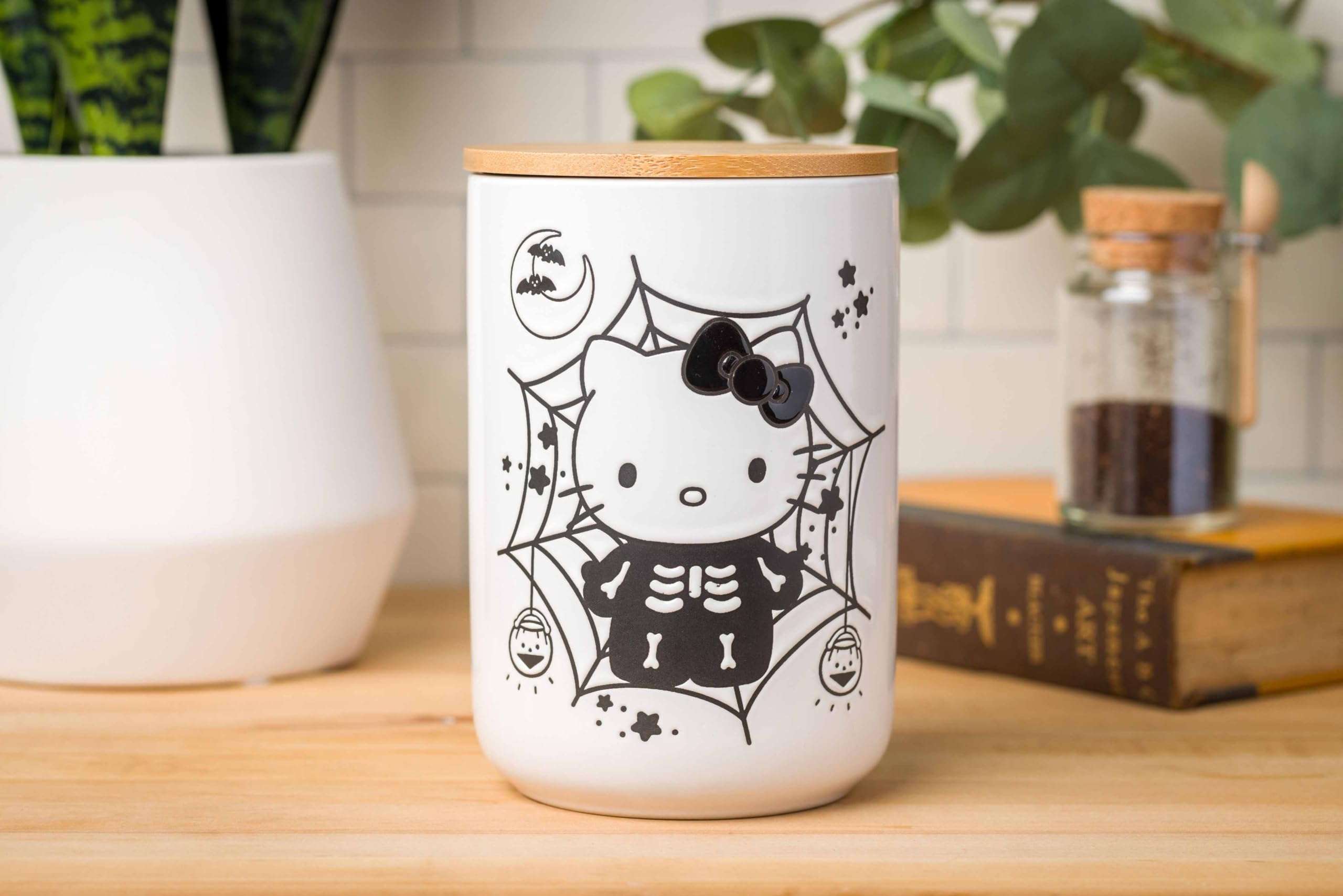 Silver Buffalo Sanrio Hello Kitty Halloween Spooky Skeleton Web Ceramic Cookie Snack Candy Jar with Airtight Bamboo Lid, Black and White (Small) 6