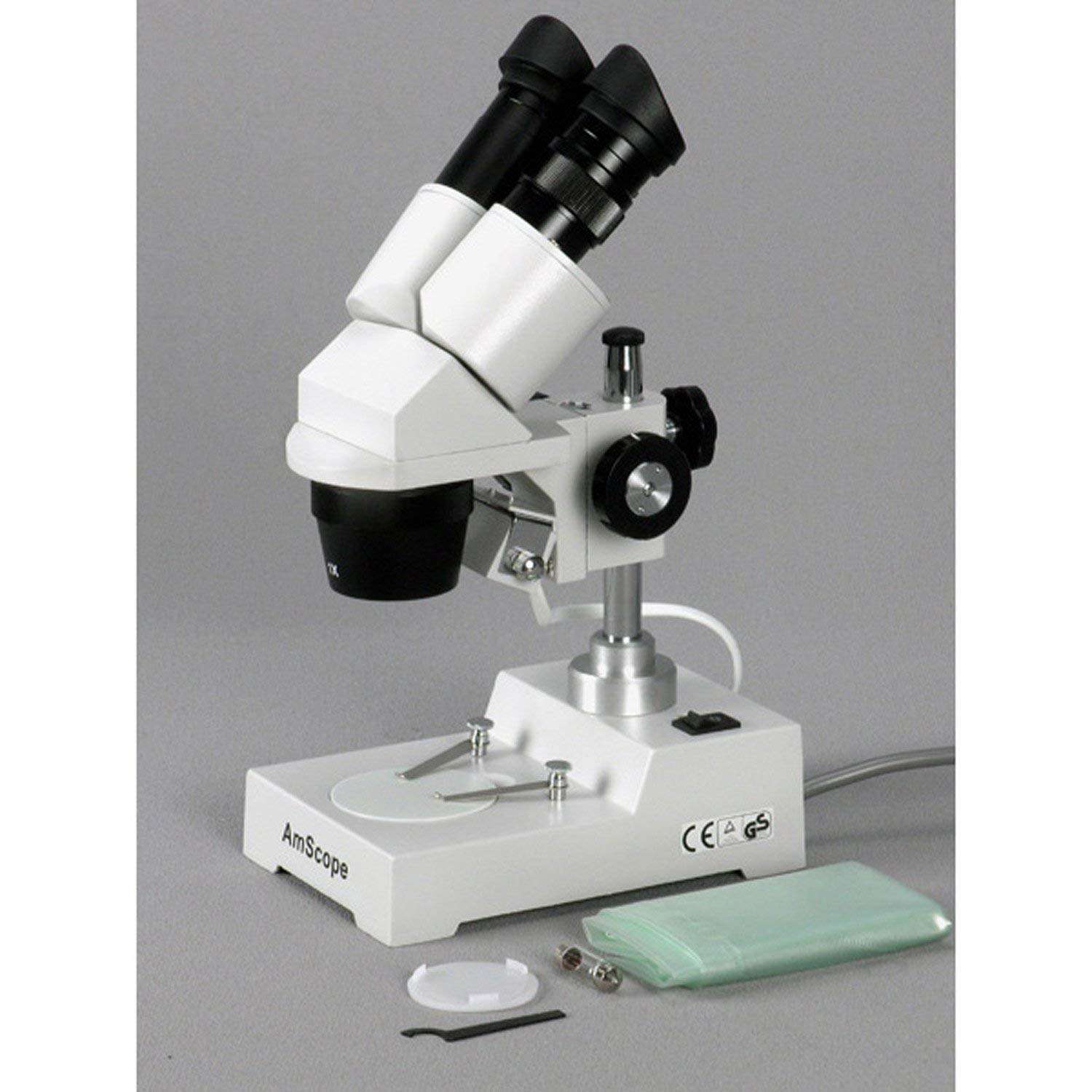 AmScope SE303-P Binocular Stereo Microscope, WF10x Eyepieces, 10X and 30X Magnification, 1X and 3X Objectives, Tungsten Lighting, Reversible Black/White Stage Plate, Pillar Stand, 110V 5