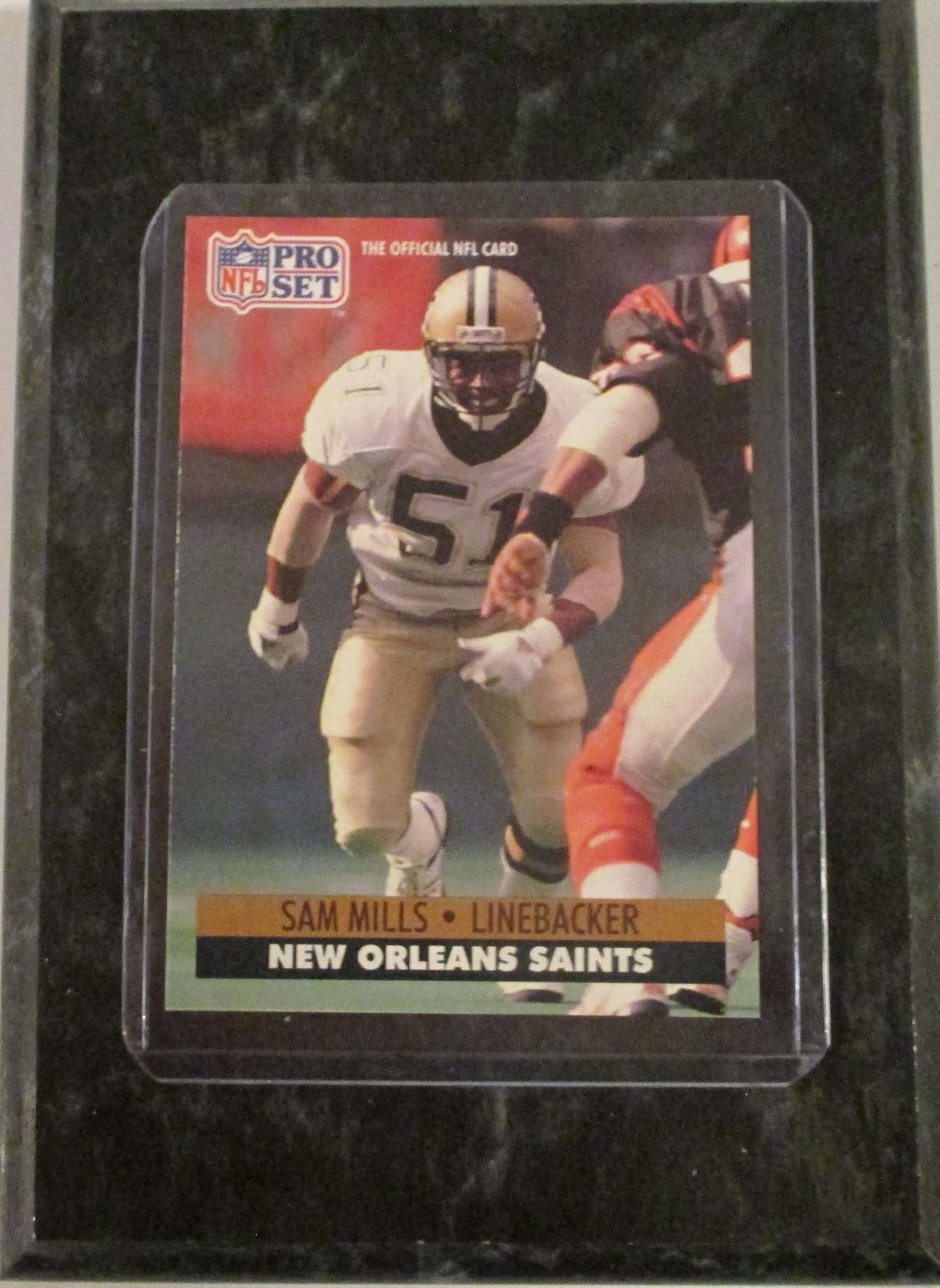 SAM MILLS NEW ORLEANS 1991 PRO SET FOOTBALL PALYER CARD MOUNTED ON A '4 X "6 BLACK MARBLE PLAQUE