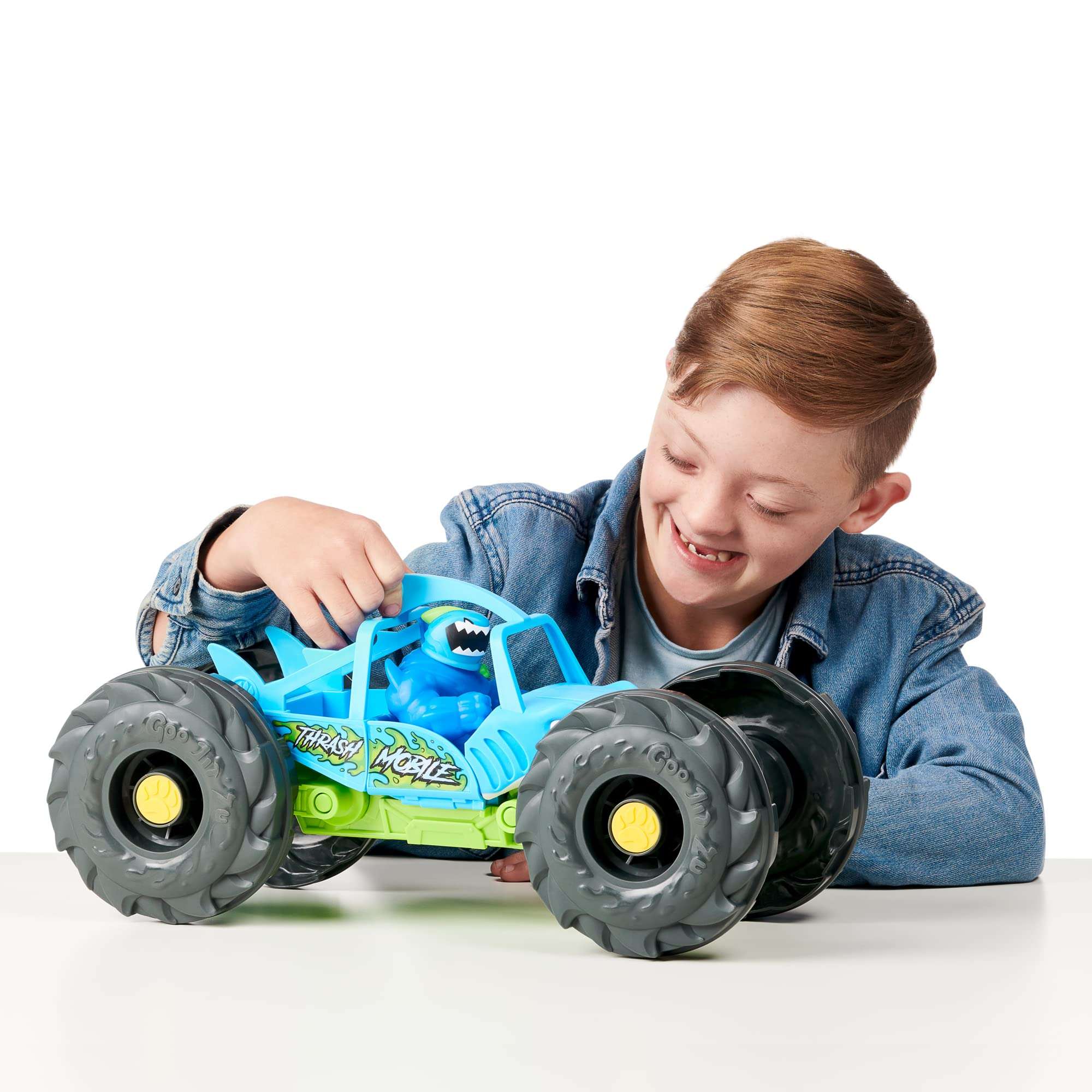 Heroes of Goo Jit Zu "Stretch and Strike Thrash Mobile! Vehicle with Missile Launcher and Stretchy, Goo Filled Exclusive Race Suit Thrash. 3